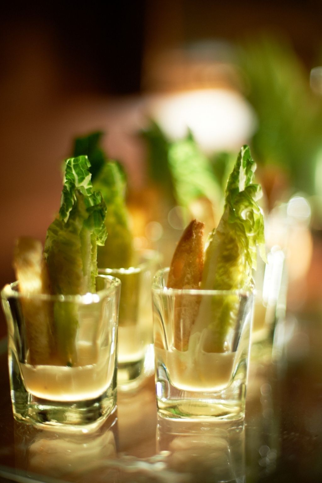 Crisp lettuce appetizers served in tasting glasses